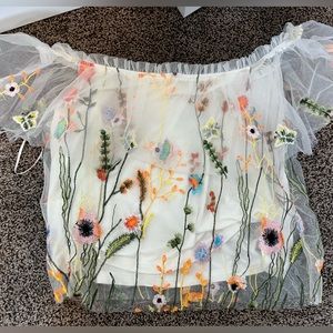 Layered embroidered off the shoulder tee